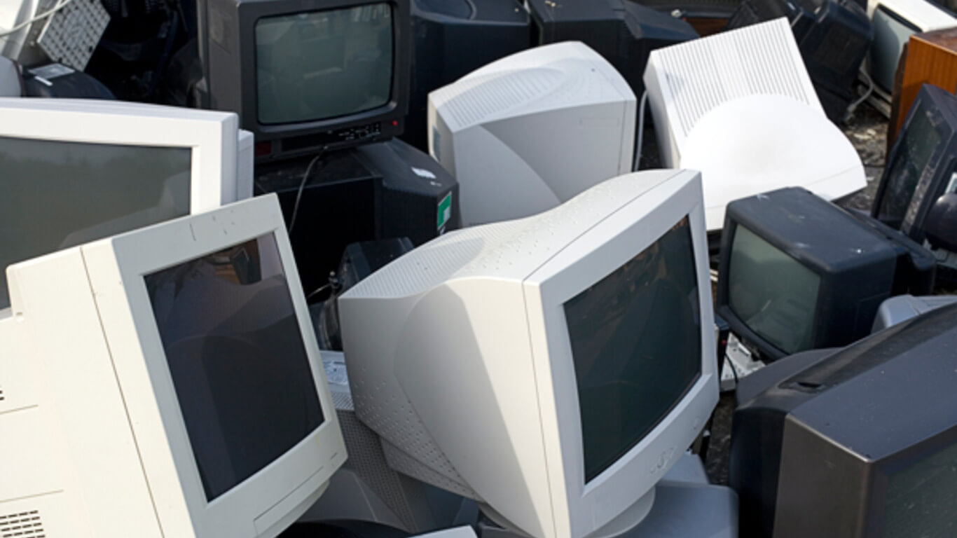 What makes CRT monitor disposal dangerous for a technician who is handling the disposal?