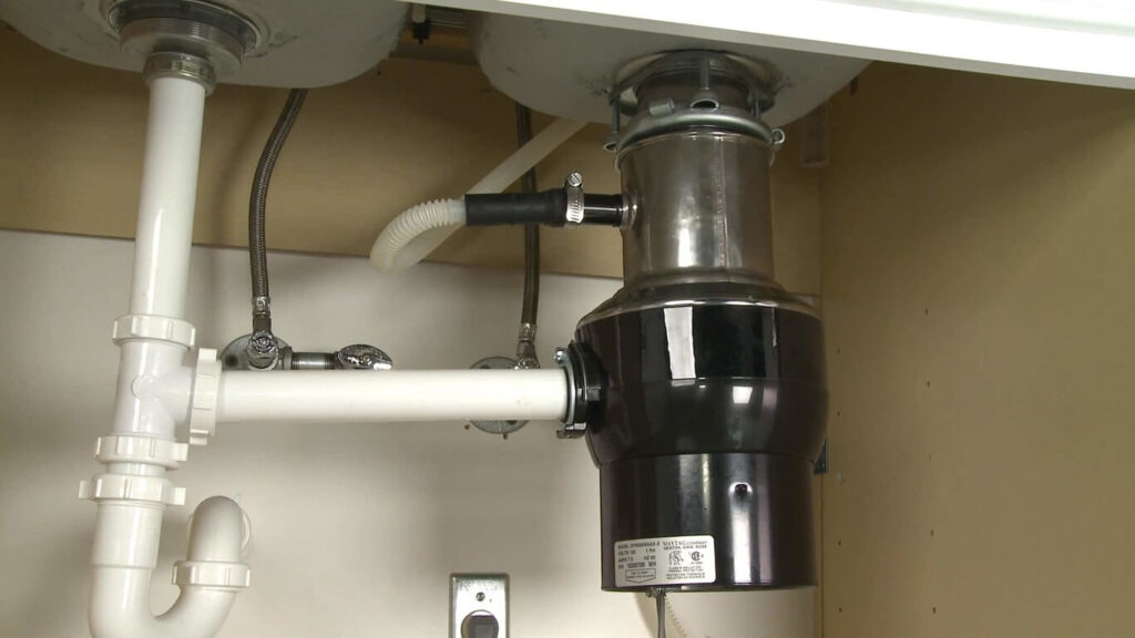 Garbage Disposal Humming But Not Spinning. How Do You Fix It